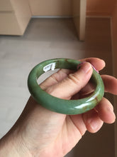 Load image into Gallery viewer, 56mm Certified Type A 100% Natural Pine Green subtle mottling russet accent Jadeite bangle KS40-1642