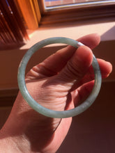 Load image into Gallery viewer, 60mm Certified Type A 100% Natural light green/blue with flying snow Guatemala slim round cut Jadeite bangle PD70-8146