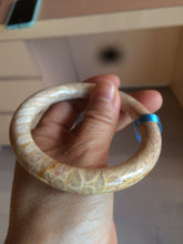 Load image into Gallery viewer, 55.6mm 100% natural beige yellow pink round cut Coral Jade (珊瑚玉) bangle SY59