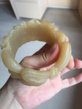 Load image into Gallery viewer, 55.3mm 100% natural yellow brown carved Peony and bow Quartzite (Shetaicui jade) bangle XY98
