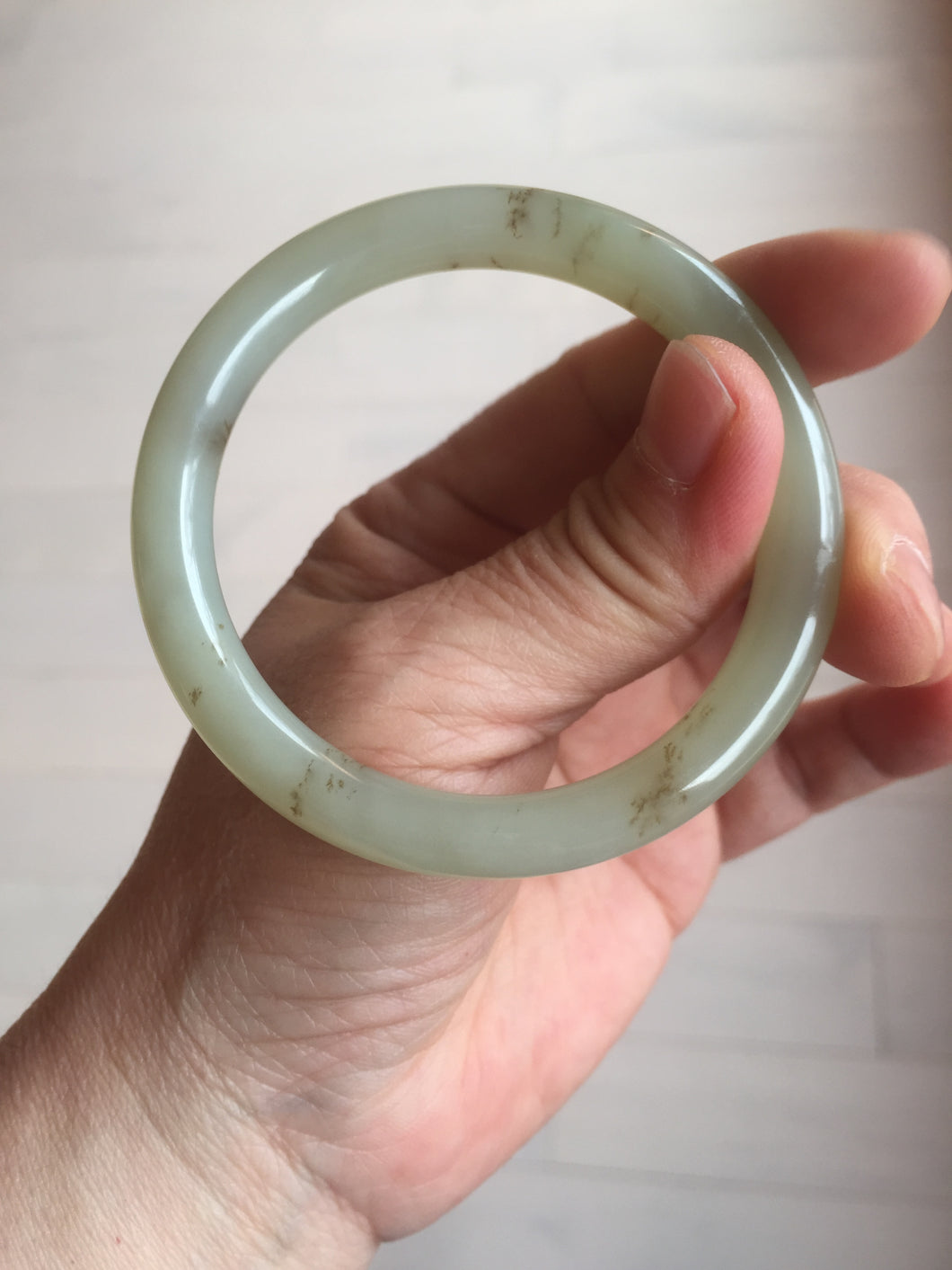 53mm 100% Natural icy watery light green with floating dandelions round cut nephrite bangle HF99
