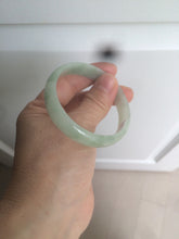 Load image into Gallery viewer, 52mm Certified Type A 100% Natural icy watery light green Jadeite Jade oval bangle Q128-7341
