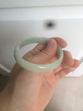 Load image into Gallery viewer, 52mm Certified Type A 100% Natural icy watery light green Jadeite Jade oval bangle Q128-7341
