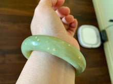 Load image into Gallery viewer, 53.1 mm 100% Natural yellow dots and green Xiu Jade (Serpentine) Chubby bangle T179
